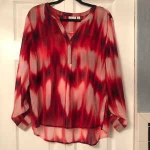 Kim Rogers red blouse